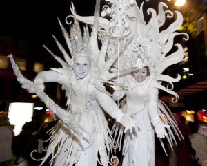 Snow Queen and Jack frost on stilts